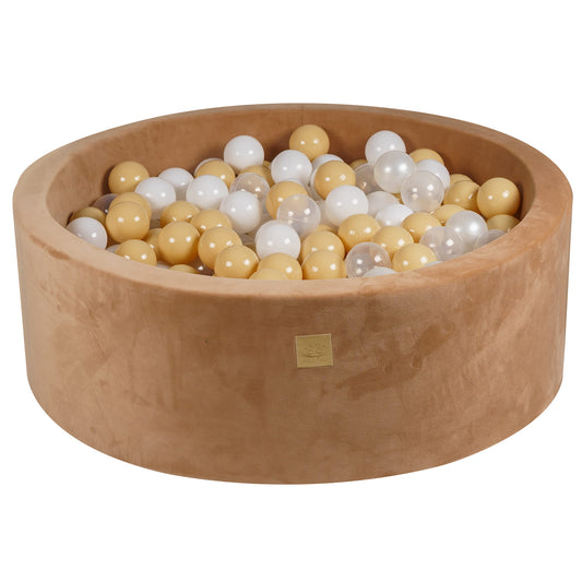 Brown ball pit for kids with white and grey play balls