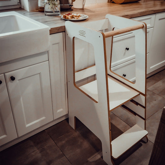 Meowbaby white wooden kitchen helper, in kitchen setting.