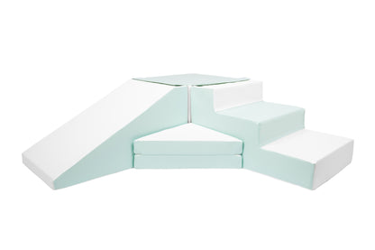 Green soft play steps designed for toddlers.