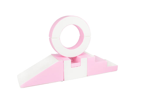 Side view of a pink-coloured hoop soft play set, perfect for toddlers to climb and play safely.